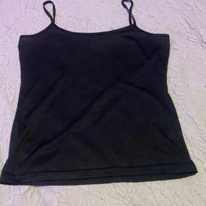 It’s a black tank top. silky it’s a women large and used but like brand new.